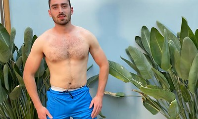 Hairy Young Muscular Hunk Wanks his Big Uncut Cock & Shoots Cum all over his Shorts!